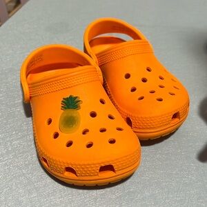Orange crocs